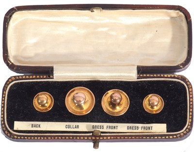 Lot 165 - Cased set of four graduated gents dress studs,...