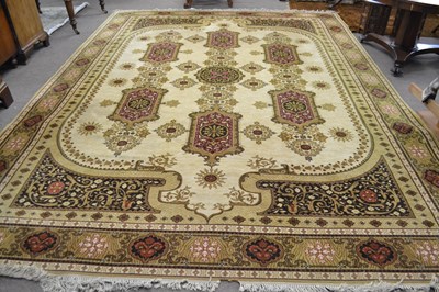 Lot 625 - A large 20th Century deep pile floor rug,...