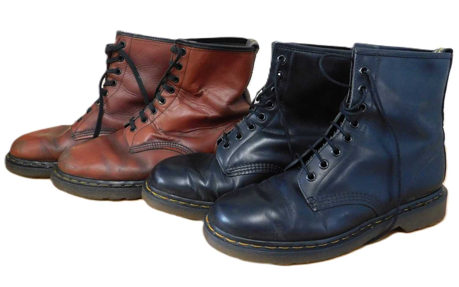 Lot 146 - Two pairs of Dr Martens boots: a pair of black...
