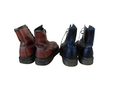 Lot 146 - Two pairs of Dr Martens boots: a pair of black...