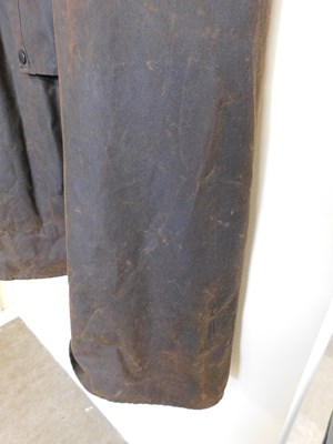 Lot 217 - A Barbour 'Stockman' coat, full length wax...