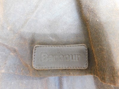 Lot 217 - A Barbour 'Stockman' coat, full length wax...