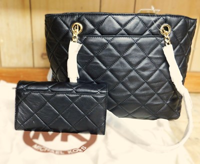 Lot 135 - A Michael Kors black quilted leather handbag...