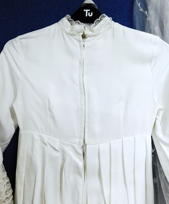 Lot 89 - A circa 1960's/70's wedding dress with lace...