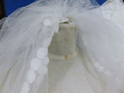 Lot 89 - A circa 1960's/70's wedding dress with lace...