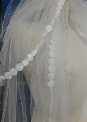 Lot 89 - A circa 1960's/70's wedding dress with lace...