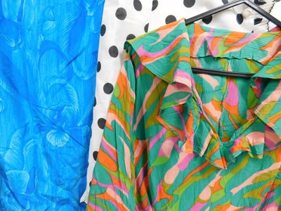 Lot 34 - Four mid 20th Century dresses to include a...