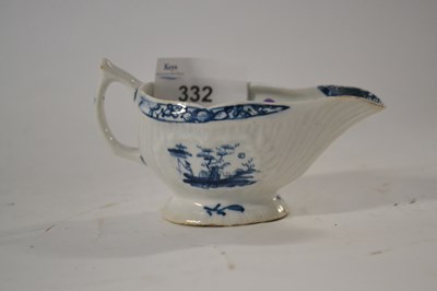 Lot 332 - A small Lowestoft porcelain cream boat with...