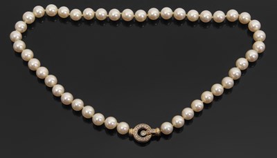 Lot 96 - A cultured pearl necklace and 18ct diamond...
