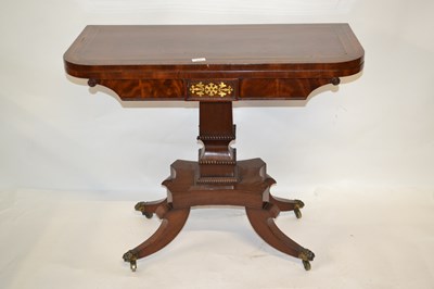 Lot 479 - A Regency mahogany and brass inlaid card table...