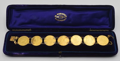 Lot 54 - Bracelet comprising of seven GRIII Gold...