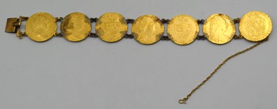 Lot 54 - Bracelet comprising of seven GRIII Gold...