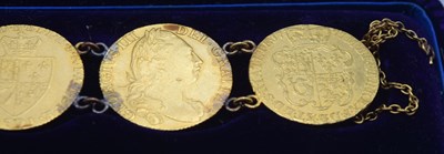 Lot 54 - Bracelet comprising of seven GRIII Gold...