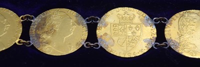 Lot 54 - Bracelet comprising of seven GRIII Gold...