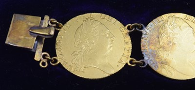 Lot 54 - Bracelet comprising of seven GRIII Gold...