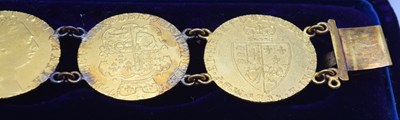 Lot 54 - Bracelet comprising of seven GRIII Gold...