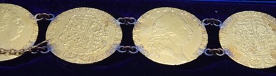Lot 54 - Bracelet comprising of seven GRIII Gold...