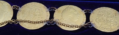 Lot 54 - Bracelet comprising of seven GRIII Gold...