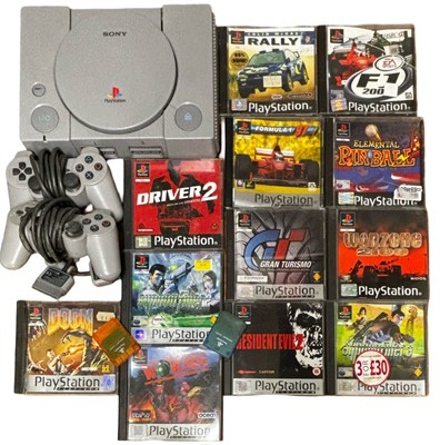 Lot 343 - A Sony Playstation One console, together with...