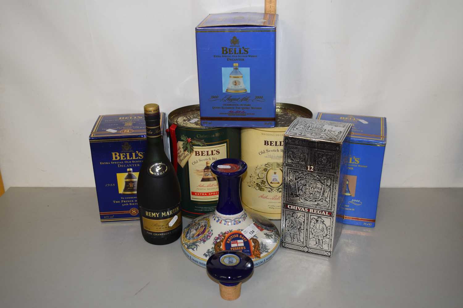 Lot 1 - A group lot to include Pussers British Navy...