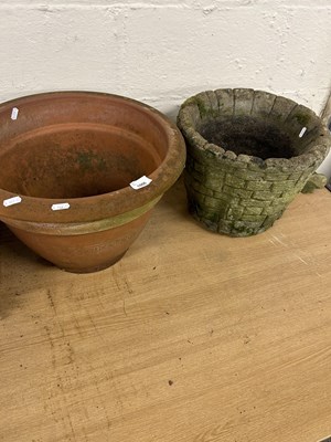 Lot 1007 - Terracotta plant pot together with a composite...