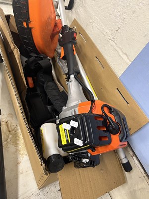Lot 1019 - A petrol multi-tool