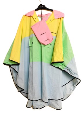 Lot 61 - A Mary Quant PVC hooded rain poncho, in pastel...