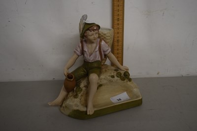 Lot 38 - Royal Dux porcelain figure of a grape picker