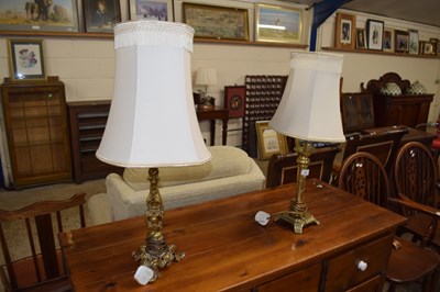 Lot 381 - Two brass table lamps with similar shades and...