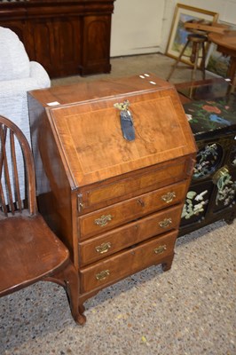 Lot 384 - Georgian style small walnut veneered bureau...