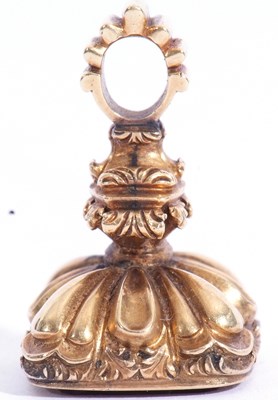 Lot 209 - Antique gold and amethyst fob, the carved fob...