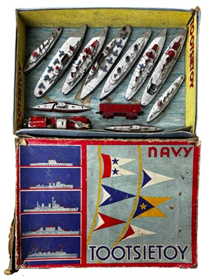 Lot 112 - A collection of die-cast TootsieToys battle...