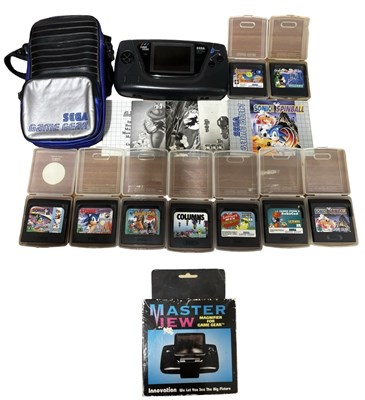 Lot 339 - A Sega GameGear handheld console, together...