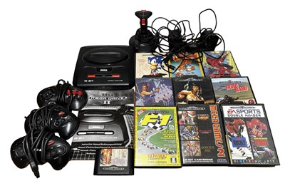 Lot 342 - A Sega Mega Drive II console, together with...