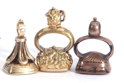 Lot 289 - Three antique metal fobs, each with coloured...