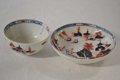 Lot 330 - A Lowestoft porcelain tea bowl and saucer in...