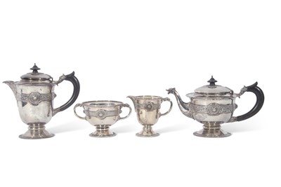 Lot 282 - George V Irish silver tea set of circular...