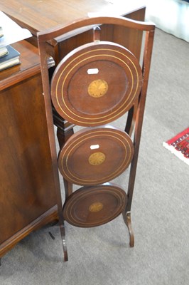 Lot 559 - An Edwardian mahogany three tier cake stand...