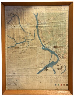 Lot 969 - A framed and glazed military-issued map of...