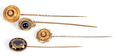 Lot 62 - Four stick pins: to include a 19th century...