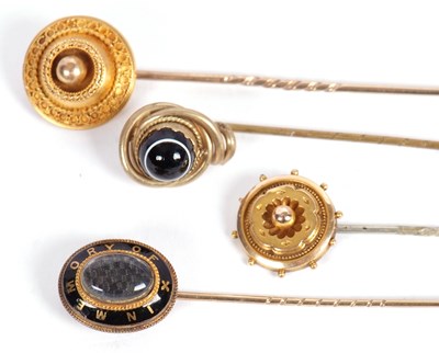 Lot 62 - Four stick pins: to include a 19th century...