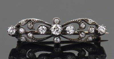 Lot 283 - A Victorian diamond brooch, the bow shape...