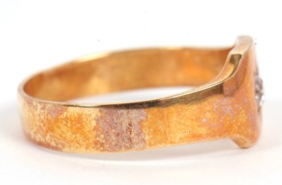 Lot 15 - A single stone diamond ring, set with an old...