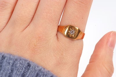Lot 15 - A single stone diamond ring, set with an old...