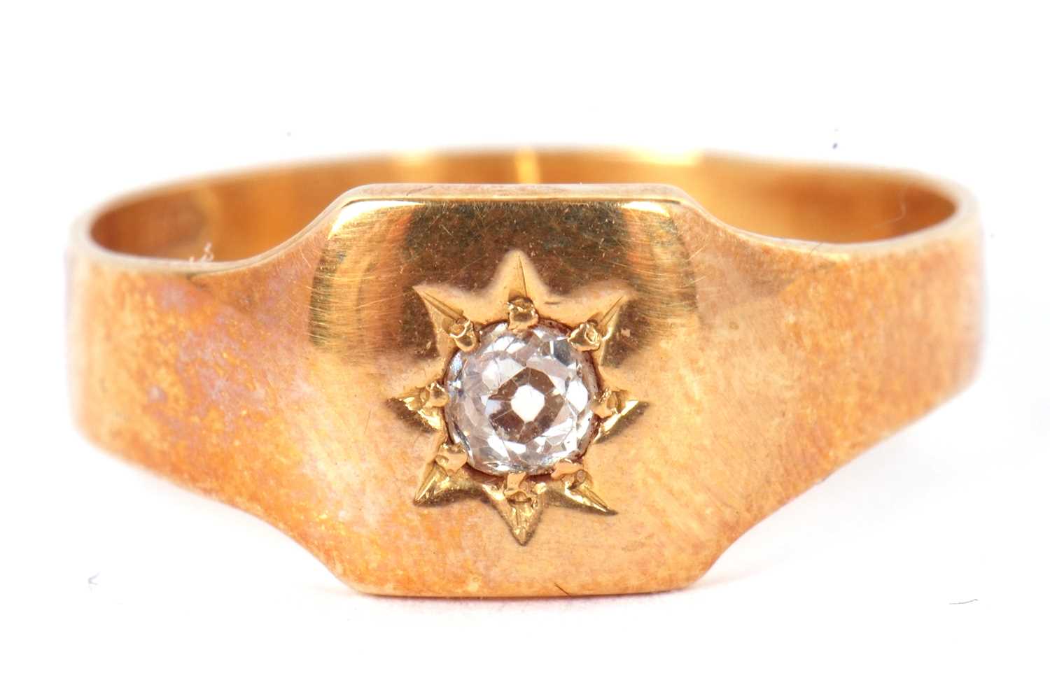 Lot 15 - A single stone diamond ring, set with an old...
