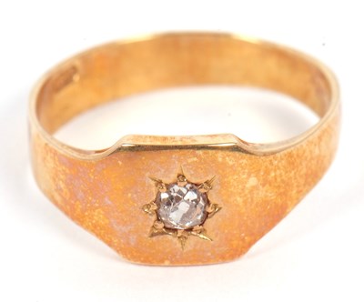 Lot 15 - A single stone diamond ring, set with an old...