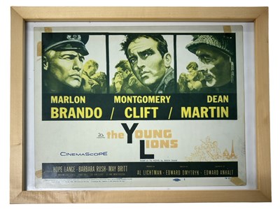 Lot 65 - A framed lobby card for The Young Lions,...