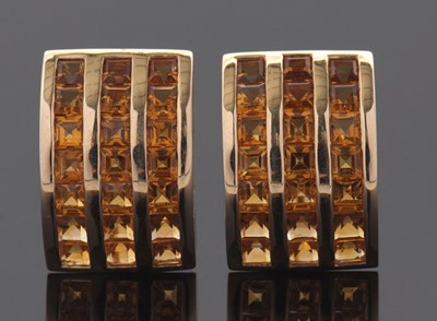 Lot 301 - A pair of citrine earrings, the curved...