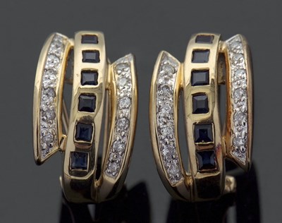 Lot 289 - A pair of sapphire and diamond earrings, set...