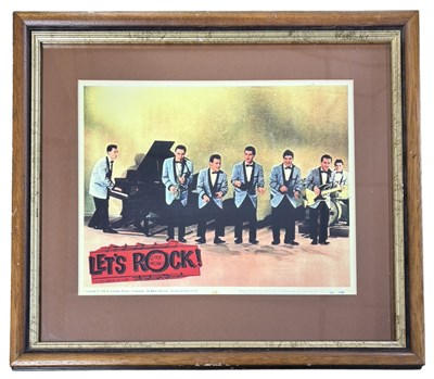Lot 67 - A framed and glazed lobby card for Let's Rock,...